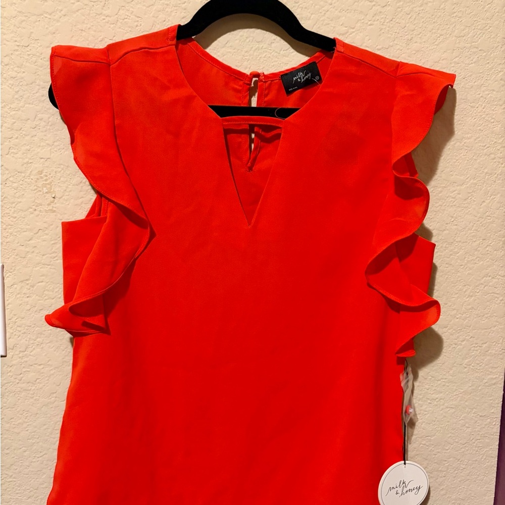 Sleeveless Red Ruffle-Trim V-Notch Blouse